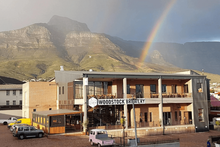 As much as Cape Town is known for its lavish and lush wine farms, there is yet another aspect that makes it stand out from other South African cities. Well, quite a few, if we're being honest. However, for the sake of this article, we'll try to stay on topic. We're referring to the other alcoholic beverage. Not one of grapes, but grain and hops. We're referring to the massive variety and collection of craft breweries and taprooms in the Cape. Have we missed any of your favourite spots? Please let us know in the comments below or email editor@whatsonincapetown.com AEGIR PROJECT BREWERY This light-hearted brewery is a family-friendly taproom in Noordhoek. They opened their doors back in 2015, and have been making a collection of beer whilst simply having fun and making friends in the process. What really makes this brewery stand out is the fact they genuinely and purely love coming up with new ideas and sharing them with their community and patrons. Every week they have a new beer that they release, with experimental flavours such as watermelon and ice cream key lime pie. That being said, they still stay true to their core beer collection. These are the Red Rye, Midnight Porter, California Common, and famous IPAs. Guests can enjoy the beautiful view of Noordhoek Beach as they sit down on the sundowner deck and sip their drink of choice, whilst the kids run around on the playground. Not sure what beer to get? Try the tasting tray of five beers they have on offer. Or, if you simply feel like having a fun sober time, the Aegir Project also has some of the best pizzas and incredible coffee on their menu. Where: 65 Beach Rd, Noordhoek, Cape Town When: All Week: 9am - 11pm Website: aegirprojectbrewery.com | Email: taproom@aegirprojectbrewery.com | Tel: 066 587 9324 Facebook: @aegirproject | Instagram: @aegirproject SHACKLETON BREWING COMPANY The Shackleton Brewery is situated in the streets of Salt River, between Observatory and Woodstock. Here, in the urban grid, all their products are produced on-site by using a brewhouse imported from across the pond in the UK. The company was started by Steve, the head brewer, after he embarked on a three-month excavation to Antarctica to research climate change and oceanography. During this time, he learnt all about Sir Ernest Shackleton and his accomplishments as an explorer. With a fondness and admiration for Shackleton’s innovation, leadership and survival skills, Steve saw it fitting to name the brewery in honour of such a man. Located upstairs above the brewery is the Shackleton Taproom. Here, guests can enjoy the industry-leading craft beers or taste the Vodka Iced Teas that the company showcases to the community. Enjoy the best-sellers or the “Otherwise? Welsh” beer, if not for the flavour, simply for the write-up stroke of genius. Where: 12 Briar Rd, Salt River, Cape Town When: Mon - Thu: 8AM - 4PM | Fri: 8am - 10pm Website: shackletonbc.co.za | Email: info@shackletonbc.co.za | Tel: 071 347 4089 Facebook: @ShackletonBrewingCompany | Instagram: @shackletonbrewing LOCAL BREWERY & CO This brewery, was devised with a beautiful goal in mind. With a desire to create a brand that welcomes people from all walks of life, Local Brewery celebrates their difference rather than simply reaffirming the common grounds or similarities. By creating a space that makes the patrons feel welcomed and at home, like a local, the brewery grants visitors a chance to share their stories over a beer. Local Brewery is adamant about using a scientific approach to ensure the consistency of their beer is high quality without compromising on the price. As for the beer; we use a scientific approach to make sure our beer is consistently high quality, without compromising on price. Tastings are available for guests as bartenders pour beers straight from the tanks. If you’d like, you can grab a seat inside the seating area or outside in the courtyard whilst you enjoy your drinks. Local Brewery claims to have one of the longest bars in town that separates the seating area and the brewery itself, so there is more than enough seating space for patrons to enjoy their drinks on their own time. Where: 35 Sussex St, Woodstock, Cape Town When: Fri: 3pm - 2am Website: localbrewery.co | Email: hello@localbrewery.co.za | Tel: 010 109 3149 Facebook: @Localbrewery&co | Instagram: @localbreweryco UKHAMBA BEERWORX This brewery was founded to embrace African history and preserve the original and true taste of local beers from our African roots. The founder, Lethu, fell in love with craft beer when he was still tending bars many years ago. He then attempted to brew his own beers from home but felt something was amiss. Soon after, he discovered that he wanted to make beers that resonate with his culture, and ipso facto, Ukhamba Beerworx is the result of his relentless hard work and determination. The brewery boasts a variety of specialty African beers made with passion and love, but above all, consistency. Guests can expect to find upbeat and vibrant music from different local artists along with the resident DJ. Enjoy the crisp cold brews as breathtaking views compliment the ambience of a typical South African and welcoming experience. For our inquisitive readers, the name Ukhamba refers to a clay pot that was used to share and pass around the traditional beer (umqombothi) of African tribesmen in a circle of fellowship. They had big pots for brewing and small pots as drinking receptacles. So, in a sense, with every sip of Ukhamba beer enjoyed amongst friends, we are technically celebrating African heritage. Where: Makers Landing, The Cruise Terminal, Victoria & Alfred Waterfront, Cape Town When: Thu - Sun: 10am - 10 pm Website: ukhamba.africa | Email: contact@ukhamba.africa | Tel: 078 417 0567 Facebook: @UkhambaBeerworx | Instagram: @ukhamba_beerworx STRIPED HORSE In the trendy streets of Muizenberg, there is a rock 'n roll-themed brewery that serves as a restaurant and taproom in one. With the trendy decor that makes you feel as though you stepped into an old Blues bar in the middle of America, this joint is a local and surfer favourite. The Striped Horse beer has three variations of liquid courage. These are the premium lager, pilsner, and milk stout. Each of these is expertly brewed with the finest ingredients and craftsmanship that results in a crisp and refreshing modern beer. Grab a drink inside whilst enjoying the music of local and talented musicians, or sit outside as you listen to the calls of the seagulls, and watch the waves of the ocean on a beautiful sunny day. Where: 12 York Rd, Muizenberg, Cape Town When: Mon - Fri: 12pm - 1am | Sat: 11am - am | Sun: 11am - 10pm Website: stripedhorse.beer | Email: info@thestripedhorse.co.za | Tel: 063 661 5713 Facebook: @TheStripedHorse | Instagram: @stripedhorsebeer WOODSTOCK BREWERY Woodstock Brewery is situated in the middle of, you guessed it, Woodstock. However, there is an additional taproom a little ways down the road in the bustling streets of Observatory. The actual brewery in Woodstock, crafts some of the finest brews in the country and offers a chance for guests to gain insight into the brewing process as they meet some of the brewers. These brewers are the brilliant minds responsible for the beers and their delicious flavour combinations. Speaking of the brews, Woodstock Brewery currently produces twelve different beers and distributes them all across South Africa. Above the brewery is the Woodstock Beerhall. This is where guests can sit down and eat some Bavarian Beerhall-style food whilst enjoying the beers on offer. There are also tastings that patrons can partake in. If you’d like to catch a breath of fresh air, there is an outside patio with tables for guests to enjoy the Cape Town urban scenery as they sip on their brew of choice. Where: 252 Albert Rd, Woodstock, Cape Town When: Mon - Fri: 12pm - 11pm | Sat: 10am - 11pm | Sun: 12pm - 6pm Website: woodstockbrewery.co.za | Email: mark@woodstockbrewery.co.za | Tel: 021 203 3045 Facebook: @WoodstockBrewery | Instagram: @woodstockbrewery STARKE BREWS Starke Brews was founded by Robert Starke in hopes to share his brews made with passion and sustainability as fundamental elements. The beers carry their own prominent and distinctive characteristics. This is displayed through the beer names and rich conceptual visuals found on the packaging or labels. These names and visuals stem from stories regarding the history of the Starke Brews farm or the farm's general unique qualities. Situated in the winelands of grassy green Durbanville Hills, this microbrewery serves an array of delicious beers and pizzas in a relaxed and tranquil atmosphere. The surroundings of the brewery allow guests to enjoy a spot of sun as they cycle on the numerous world-class mountain bike tracks on the Contermanskloof farm. Bring the family and enjoy the relaxing outdoors at the Starke Brewery. Where: Contermanskloof farm, Contermanskloof Rd, Durbanville, Cape Town When: Fri: 12pm - 7pm | Sat: 11am - 6pm | Sun: 11am - 4pm Website: s-basler.net | Email: margauxstarke@gmail.com | Tel: 082 588 6933 Facebook: @StarkeBrews | Instagram: @starkbrews HOOGEBERG BREWING CO Hoogeberg brewing company is situated on the ever-popular Hooggelegen Farm. This might sound familiar to you because it is the Signal Gun Wines farm. Hooggelegen Farm is one of the oldest family-owned wine farms in the Durbanville area. It has been in the De Wit family for over six generations. And, with a special thanks to M.J. de Wit and his wife, Estani, for following their dreams and vision to make Hooggelegen Farm a family-friendly destination, Signal Gun has been running since 2010. However, the farm has evolved from a quaint food and wine restaurant into a full day’s visit with additional tasting rooms and a craft beer range. The cellar master, M.J de Wit, decided to take a leap of faith and delve into a new direction; craft beer. With great success, the farm now brews a variety of craft beers to choose from. These can be tasted and enjoyed on the farm or taken home in their new and cleverly designed labelled bottles. So, essentially, if you have family members that might not be intrigued by craft beer, then perhaps the wine on offer from the wine farm will tickle their fancy. Because of the variety, we believe Signal Gun to be a great place to visit. Where: Signal Gun Wines, Hooggelegen Rd, Durbanville, Cape Town When: Tue - Sat: 9am - 10pm | Sun: 9am - 6pm Website: signalgun.com | Email: reception@signalgun.com | Tel: 021 976 7343 Facebook: @HoogebergBrewingCo | Instagram: @hoogebergbrewingco KINGS CRAFT BEER The Kings Craft group was created and developed out of a passion to craft products. The company is locally popular for the delicious artisanal coffee and craft beer products they produce. Cliff, one of the founders, started brewing beer with a home kit back in 2009. A few years later, he came in contact with William Battersby, an experienced FMCG Sales Director, and together they started the Kings Craft Brewing Company. Together they produced their first LionHeart Lager in 2013, and since then, the company gained a lot of shareholders and has grown exponentially. In 2017, Kings Craft Brewing Company moved into a warehouse which serves as its base of operations, cold room, entertainment area, and taproom all under one roof. Grab your choice of drink, whether it's beer, coffee or even the gin and tonic, there is something to entice all patrons. See here to shop for some of the bigger scale items such as kegs or taps. Where: 24 Shropshire St, Cape Town When: Mon - Fri: 8am - 5pm Website: kingscraft.co.za | Email: info@kingscraftbeer.co.za | Tel: 082 332 7839 Facebook: @KingsCraftBrewingCo | Instagram: @kingscraftbrewingco