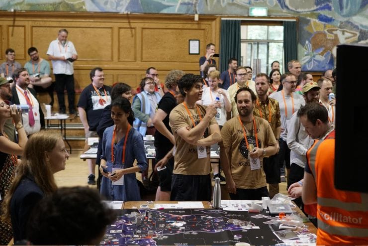 mega game players crowd board game